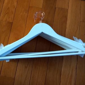 Set of 10 white wooden dress hangers